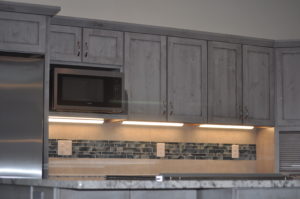 photo of Grand Junction, Colo. • Residential Kitchen Remodel • Medallion Cabinets in knotty alder wood • peppercorn finish